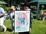 Sir John A. Macdonald holding the 1878 Election Poster